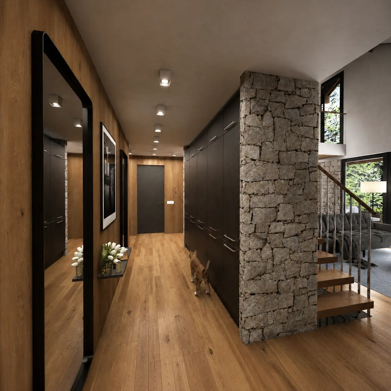 Entrance hall with stone wall and open stair